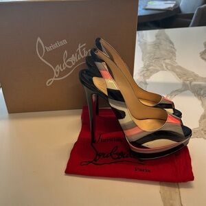 Christian Louboutin heels. I am a true US 7.5 size and they fit perfectly.
